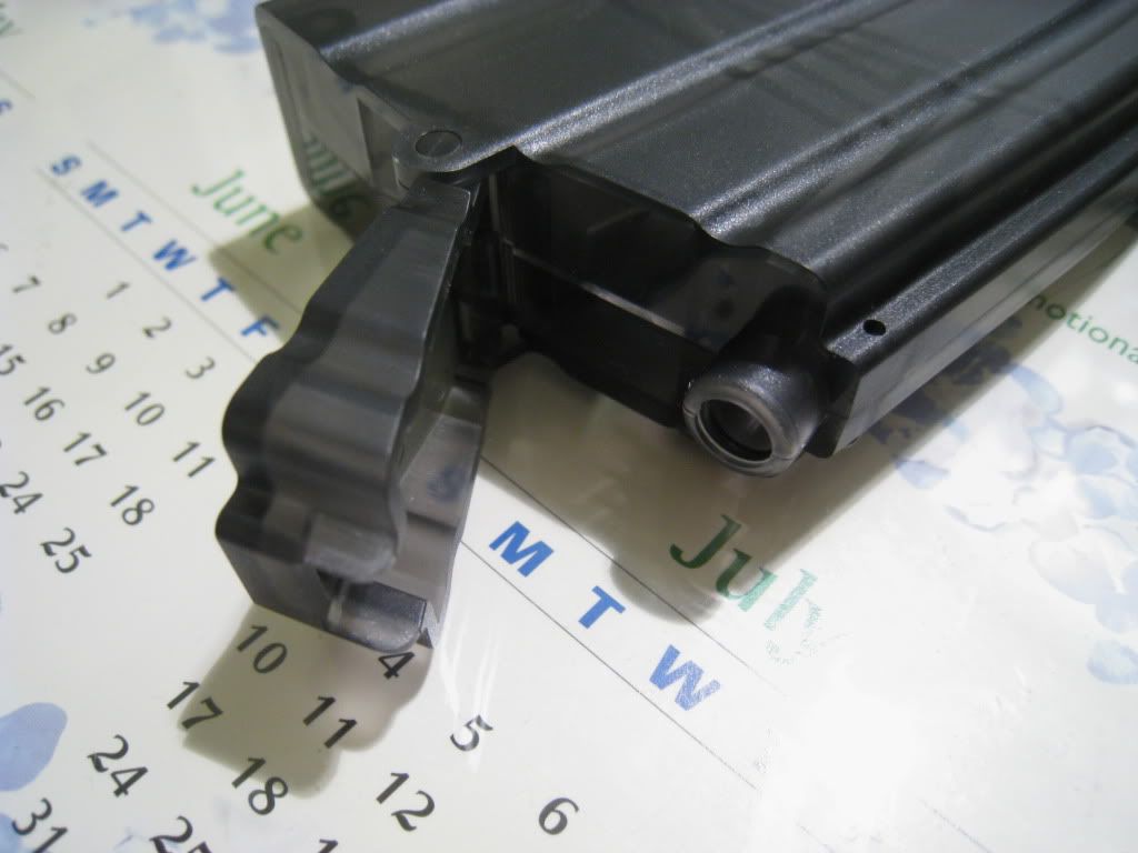 http://i8.photobucket.com/albums/a1/aznriptide859/Airsoft/KWA Magazine Speed Loader/IMG_1377.jpg